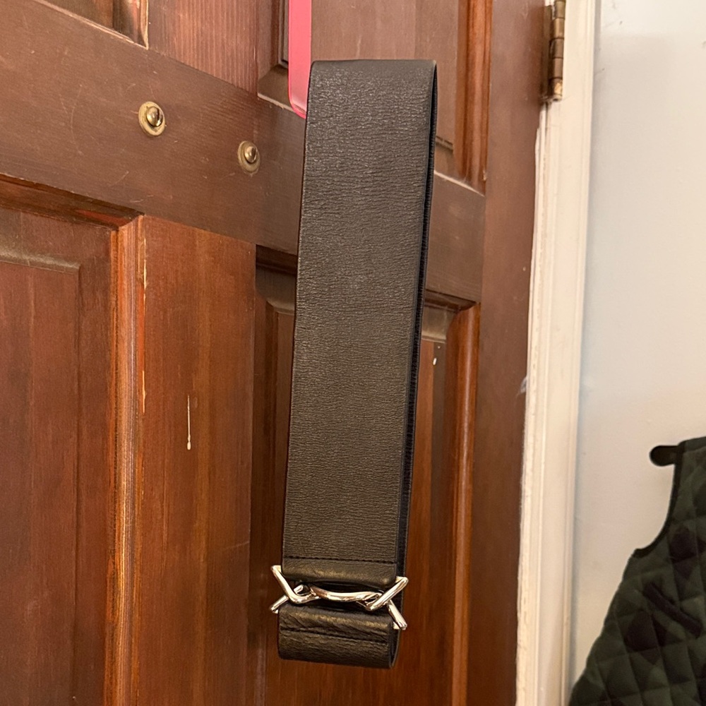 Black Elastic Belt with Silver Buckle, Looks Like Leather.